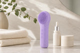 Cepillo facial Velura en el baño